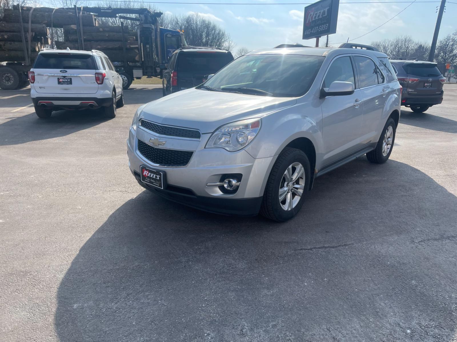 2013 Silver /Black Chevrolet Equinox 2LT 2WD (2GNALPEK5D6) with an 2.4L I4 DOHC 16V engine, 6-Speed Automatic transmission, located at 11115 Chardon Rd. , Chardon, OH, 44024, (440) 214-9705, 41.580246, -81.241943 - This 2013 Chevrolet Equinox 2LT FWD with the 2.4L EcoTec engine pairs fuel efficiency with comfort and technology. It comes equipped with a 6-speed automatic transmission assuring smooth transitions and features heated seats for added comfort during colder months. The automatic climate control syste - Photo #0